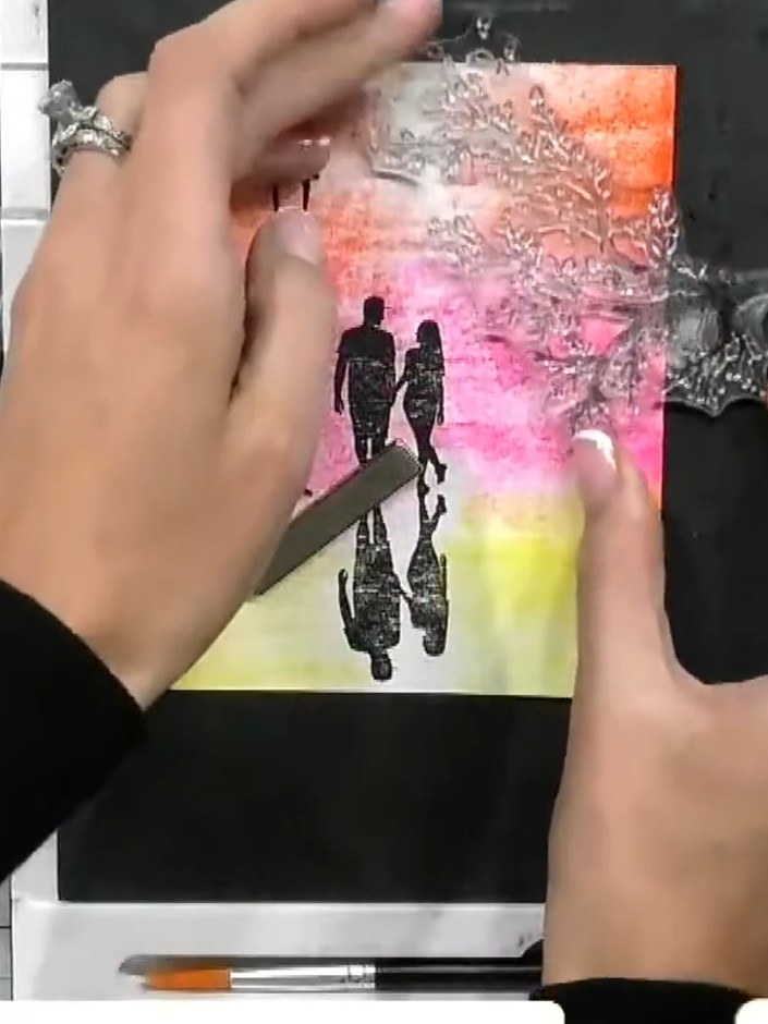 Step 5: Stamp a tree silhouette from the 'Into the Woods' stamp set using black ink. Tilt the stamp as you apply it so