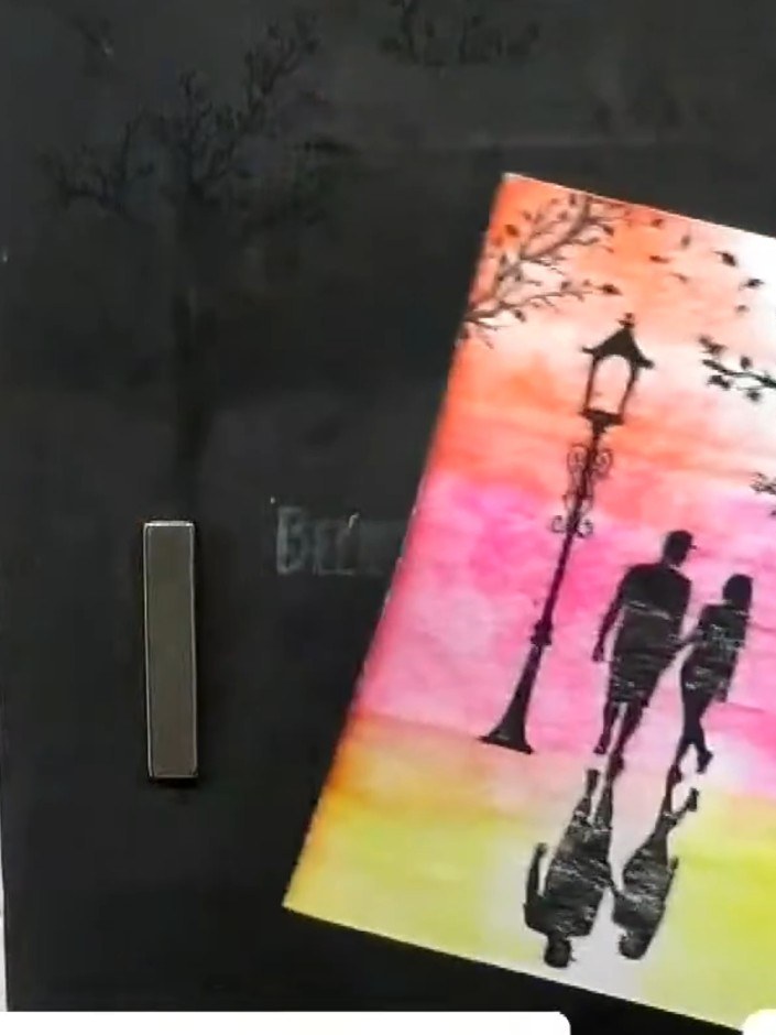 Step 8: Using a black fine liner or gel pen, draw a thin border around the edge of your finished card panel to create 