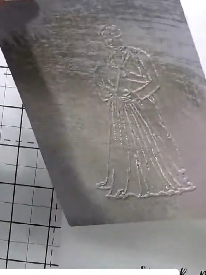 Step 3: Run the embossed paper through your die-cutting machine to create the raised design. The embossing folder crea