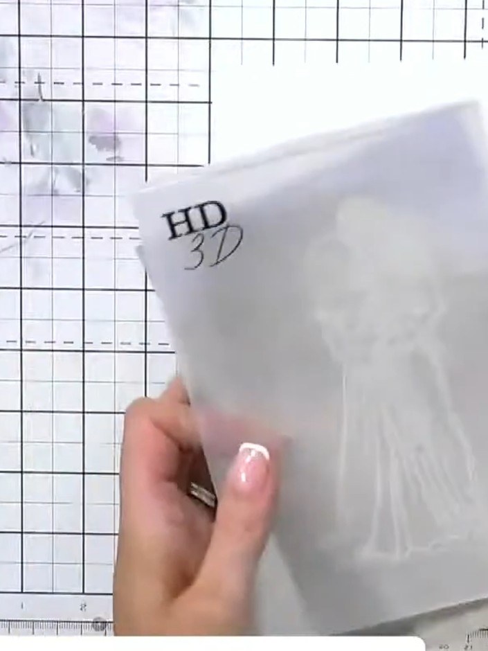 Step 4: Carefully lift the paper from the embossing folder. Examine the embossed detail, which will be raised on one s