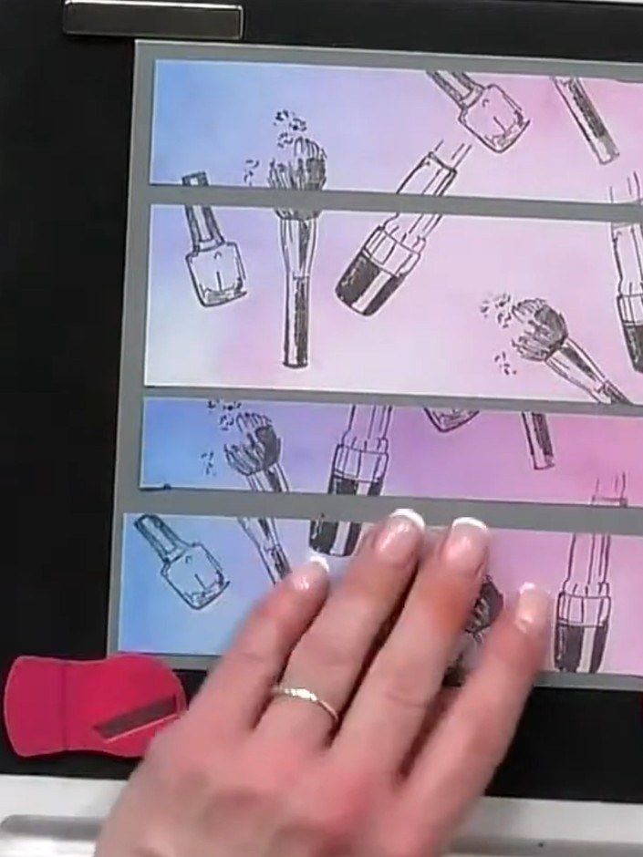 Step 1: Create an ombre background on white cardstock using watercolour or ink washes in pink and blue tones. Blend th
