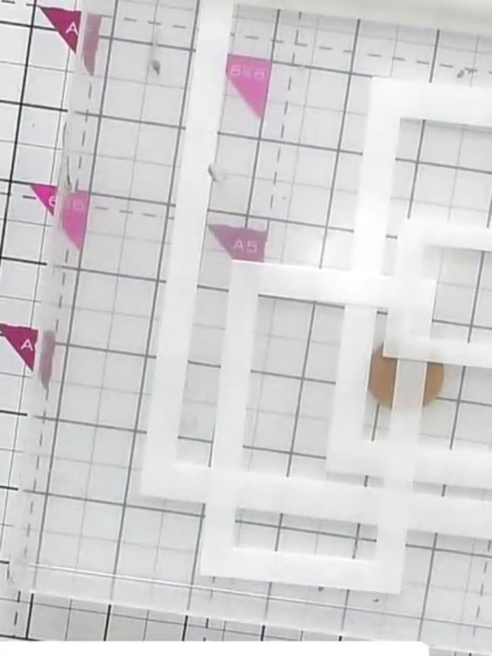 Step 1: Layer multiple Essential Frames stencils on top of each other on your gel plate. Use magnets to anchor the ste