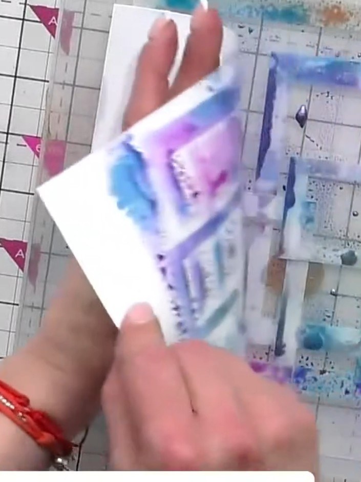 Step 3: Add a small amount of water to the stencilled areas to loosen the ink slightly. This will create a more fluid,
