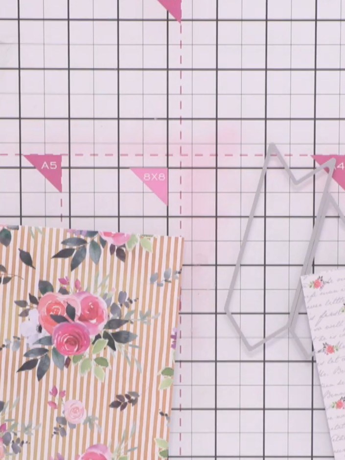 Step 2: Cut your selected patterned papers down to size. Run them through your A5 die-cutting machine to create banner