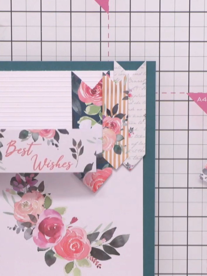 Step 7: Arrange your decorative sentiment banners on the card front, positioning them to add visual interest and guide