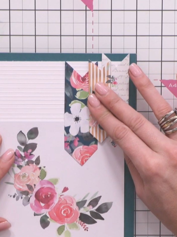 Step 9: Cut a small mat from your paper offcuts and adhere it behind the raised middle banner to hide any gaps or join