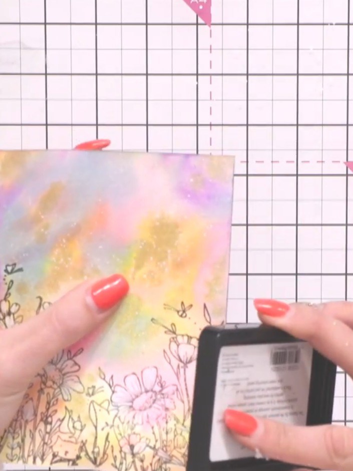 Step 11: Edge the entire card by tilting your black ink pad and running it around all four sides to create a frame effe