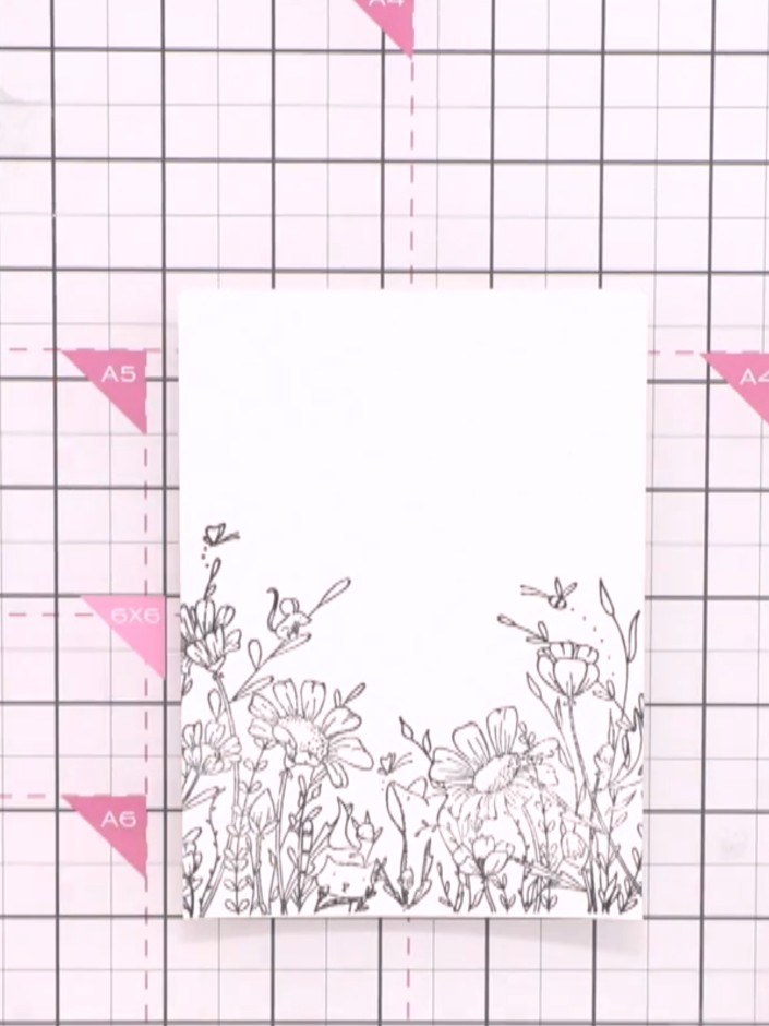 Step 2: Allow the stamped floral image to dry completely. Using a flat brush, wet the entire card surface with clean w