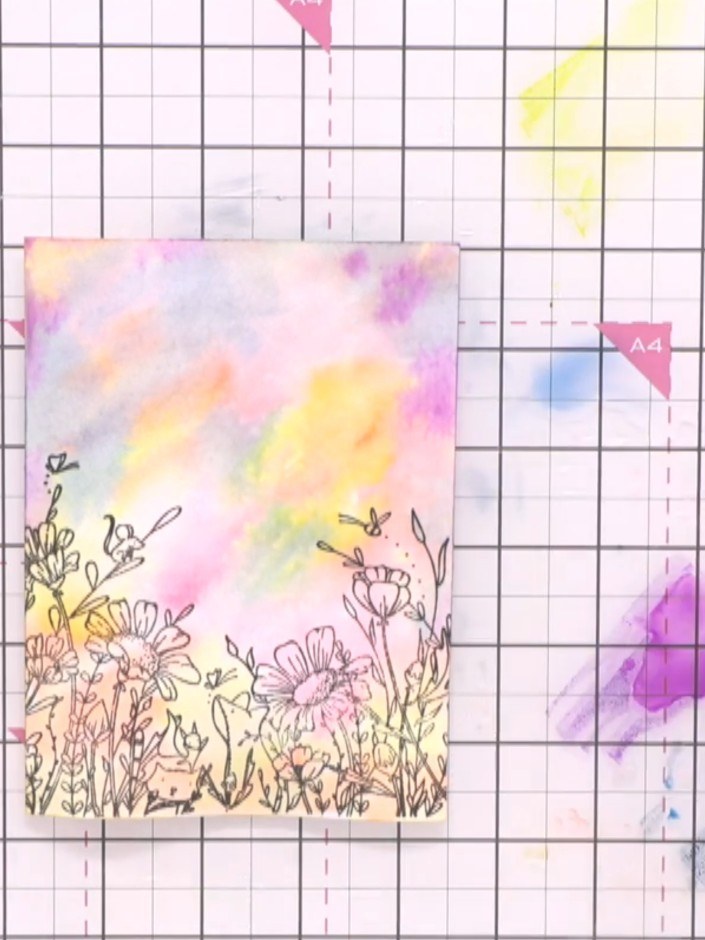 Aquarell-Polarlicht-Karte mit gestempelten Blumen - the finished project
