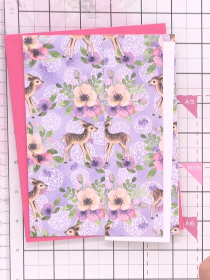 Step 3: Select a pink card blank to use as your card base. This will form the foundation for your fussy cut flower car