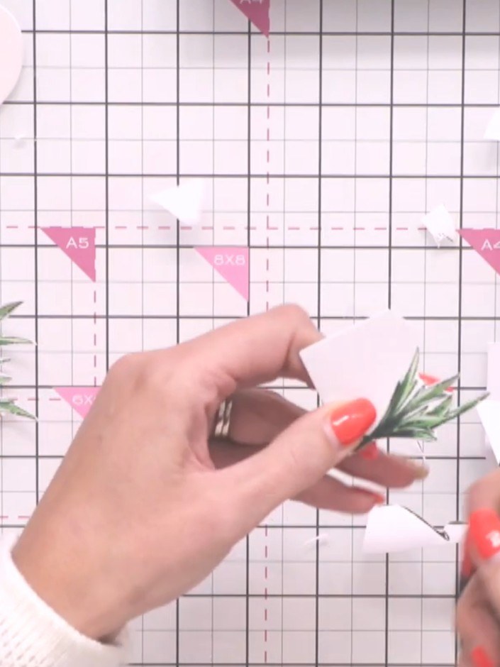 Step 3: Fussy-cut three floral embellishments from the sheet. If your cutting isn't perfectly precise, cut slightly la