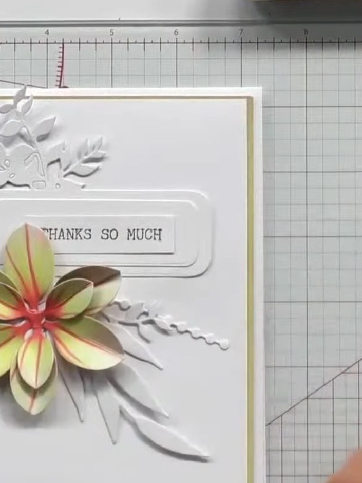 Step 4: Attach the completed layered flower mount to your card blank using foam pads or adhesive. The mount can be use