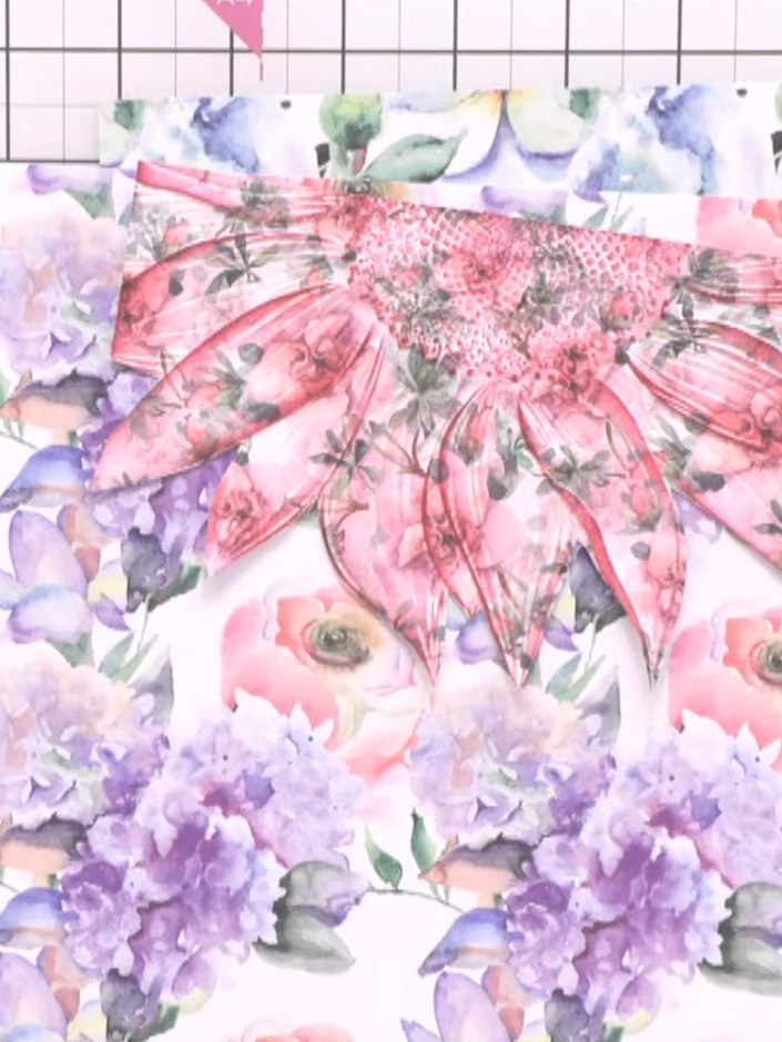 Step 5: Run a piece of white cardstock through an embossing folder to create a textured panel with the pink butterfly 