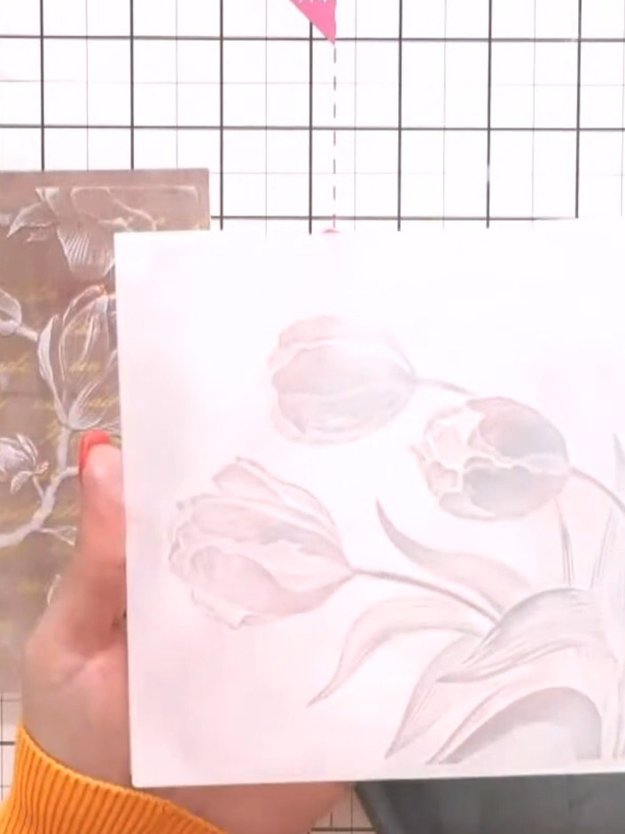 Step 2: Run the vellum through the die-cutting machine with the tulip embossing folder to create the raised floral des