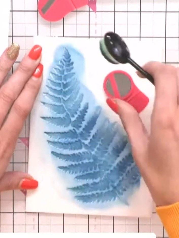 Step 4: Reposition the stencil slightly down and to the right to create the drop shadow effect. The stencil should be 