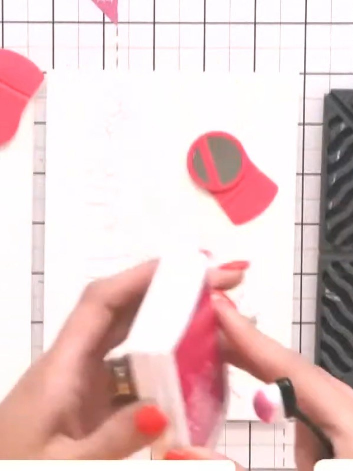 Step 2: Apply pink ink through the floral stencil using a brush, working the colour into the design. Give the stencil 