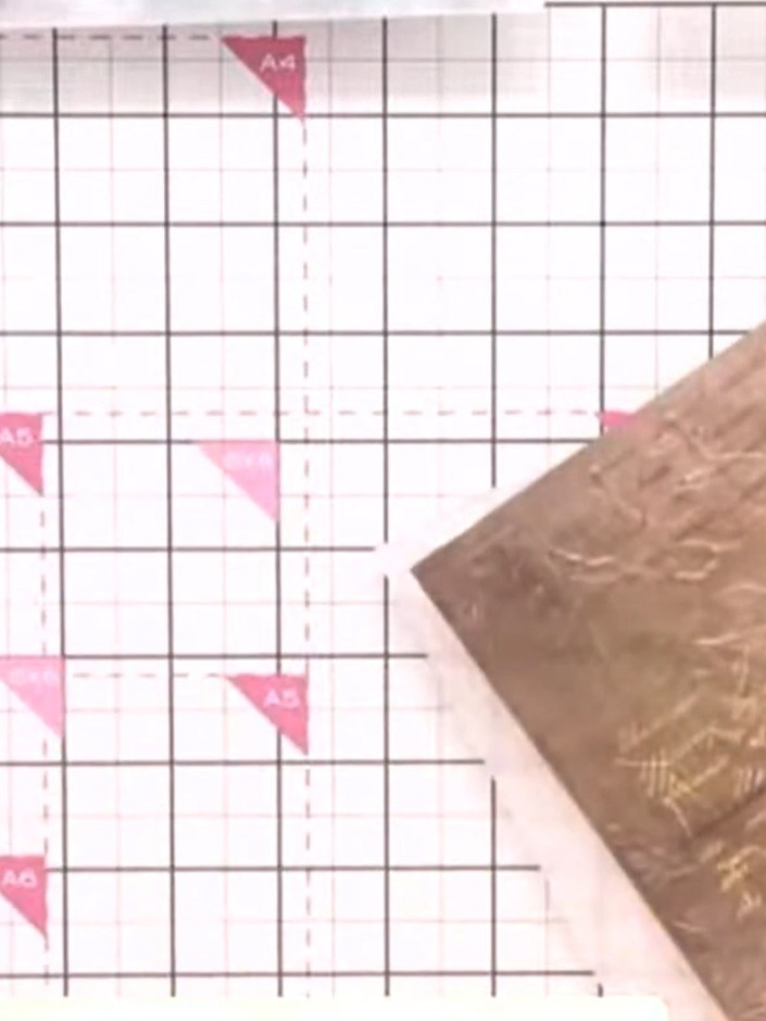 Step 3: Run the vellum through your die-cutting machine with the Magnolia embossing folder to create the embossed patt