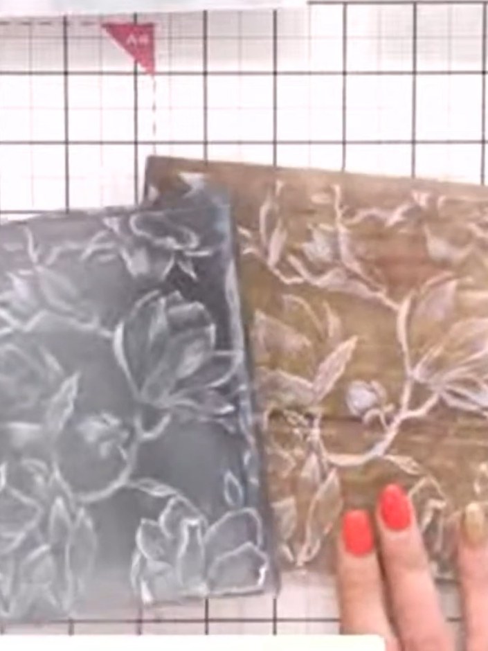 Step 4: Carefully lift the embossed vellum sheet away from the embossing folder to reveal the raised floral texture de