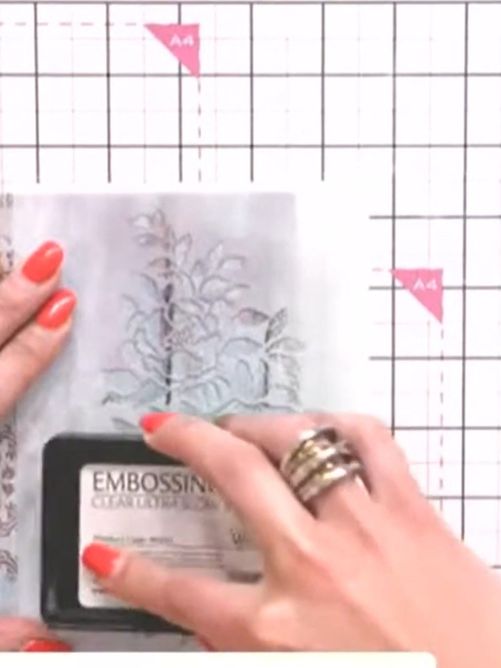 Step 3: Position the fern stencil over your paper. Apply sticky embossing ink through the stencil using an ink pad, ma
