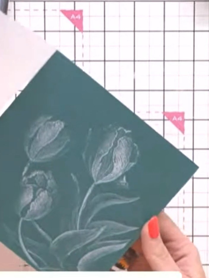 Step 9: Mount the embossed teal panel onto your card base to complete the card front.