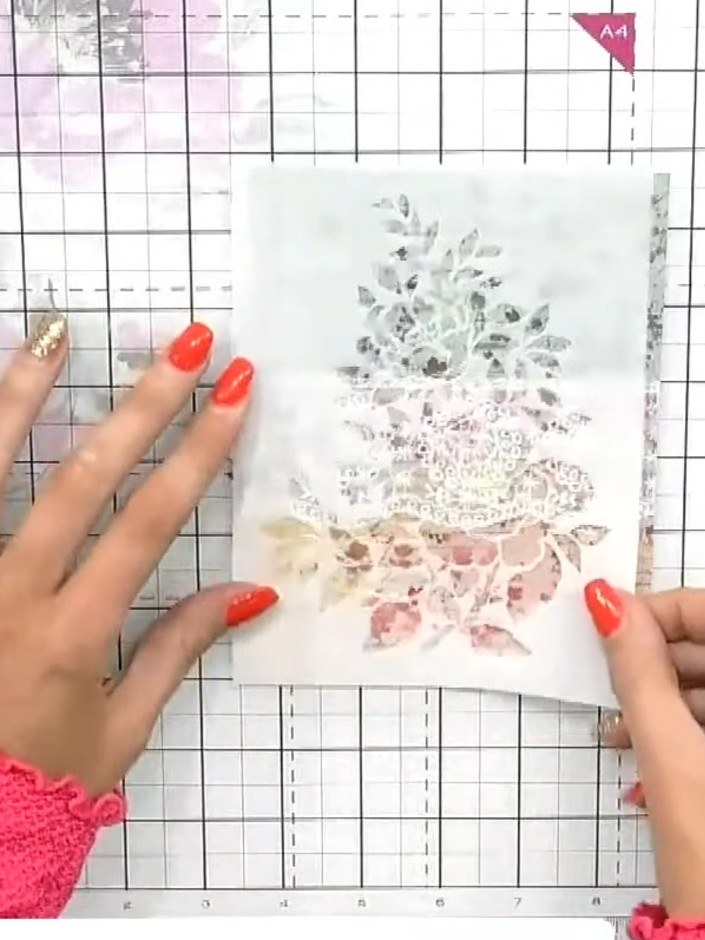 Step 1: Cut a piece from the patterned paper featuring the lace border design. Position it on your card base, placing 