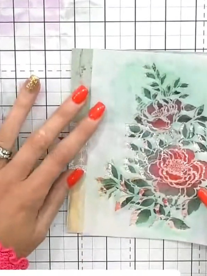 Step 6: If the colour appears too dark, remove the stencil and use a clean brush with white pigment ink to gently push