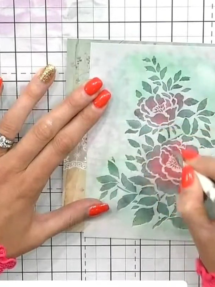 Step 7: Using a glitter glue pen, apply colourless glitter glue randomly to some of the leaves on your stencilled desi