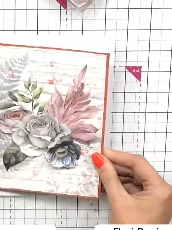 Step 9: Mount the completed floral design onto a white card base using adhesive. Ensure the design is centred and pres