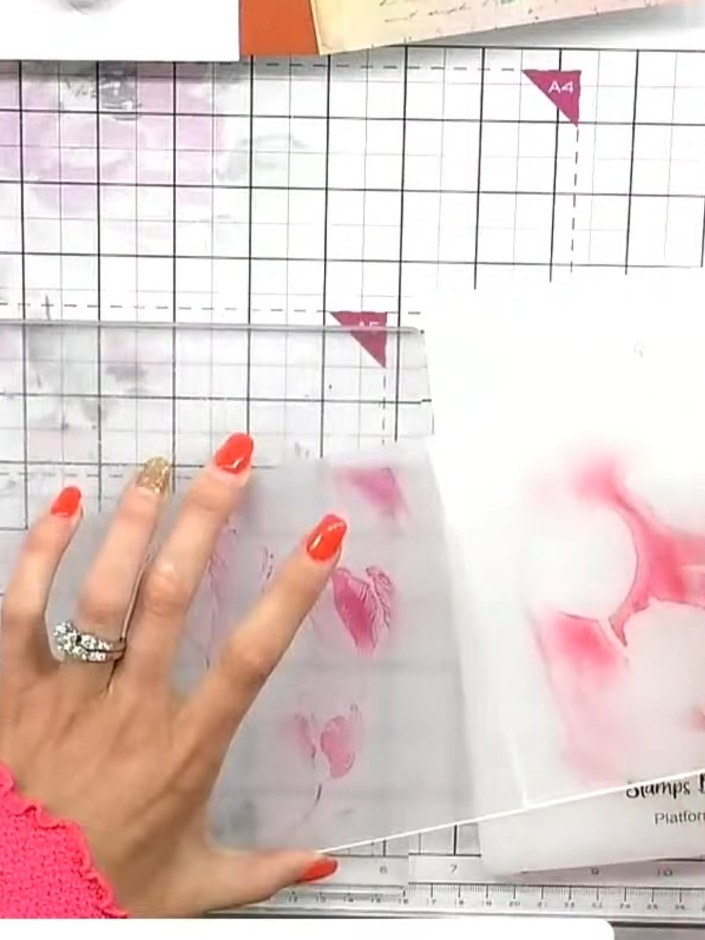 Step 3: Place your card stock inside the inked embossing folder, ensuring it is positioned centrally between the two h