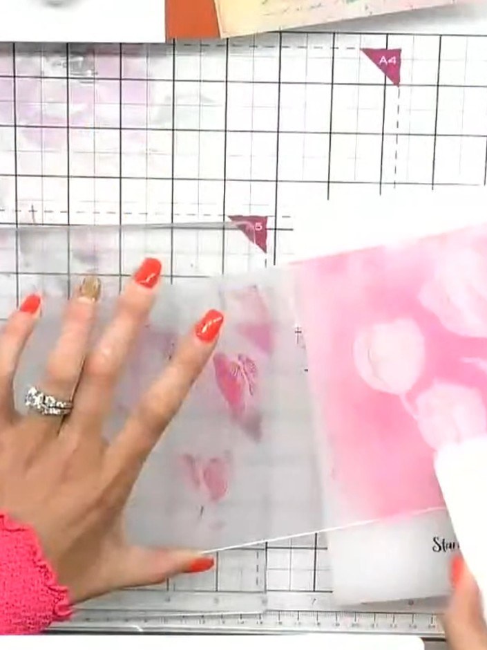 Step 4: Close the embossing folder and run it through your embossing machine to transfer the inked pattern onto the ca