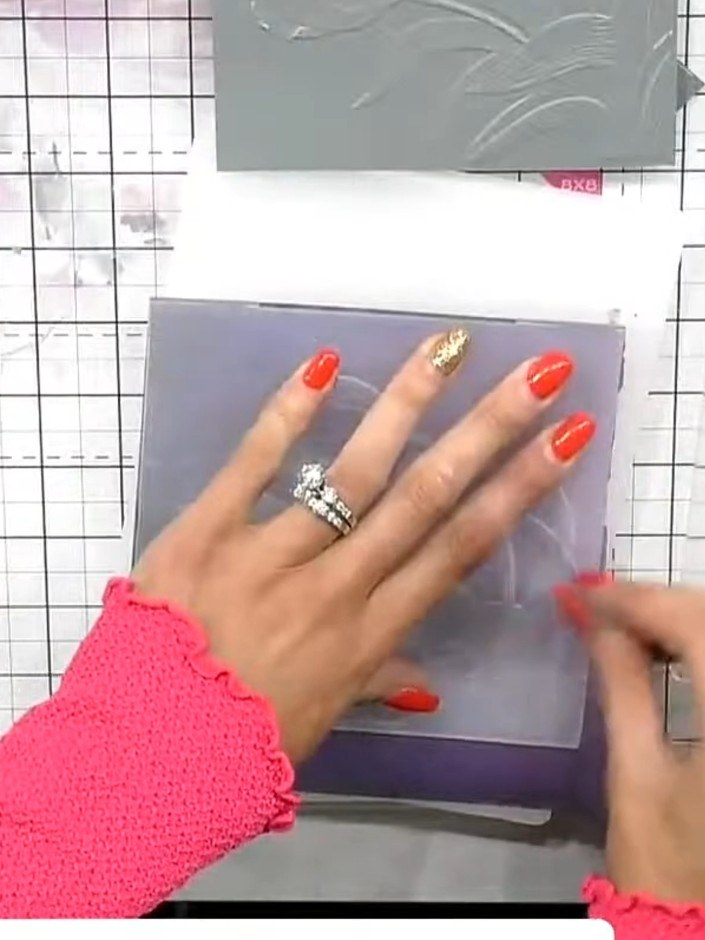 Step 7: Lightly swipe white pigment ink across the raised areas of the embossed vellum to highlight the design.