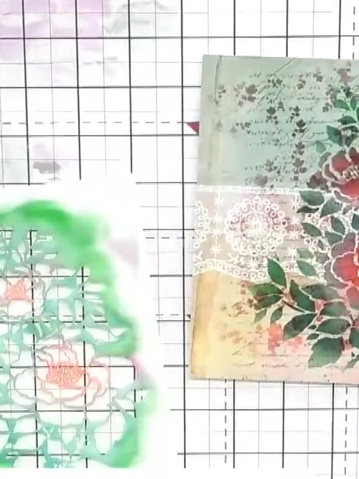 Step 6: Carefully lift and remove the stencil from the vellum to reveal the multi-coloured floral design underneath.