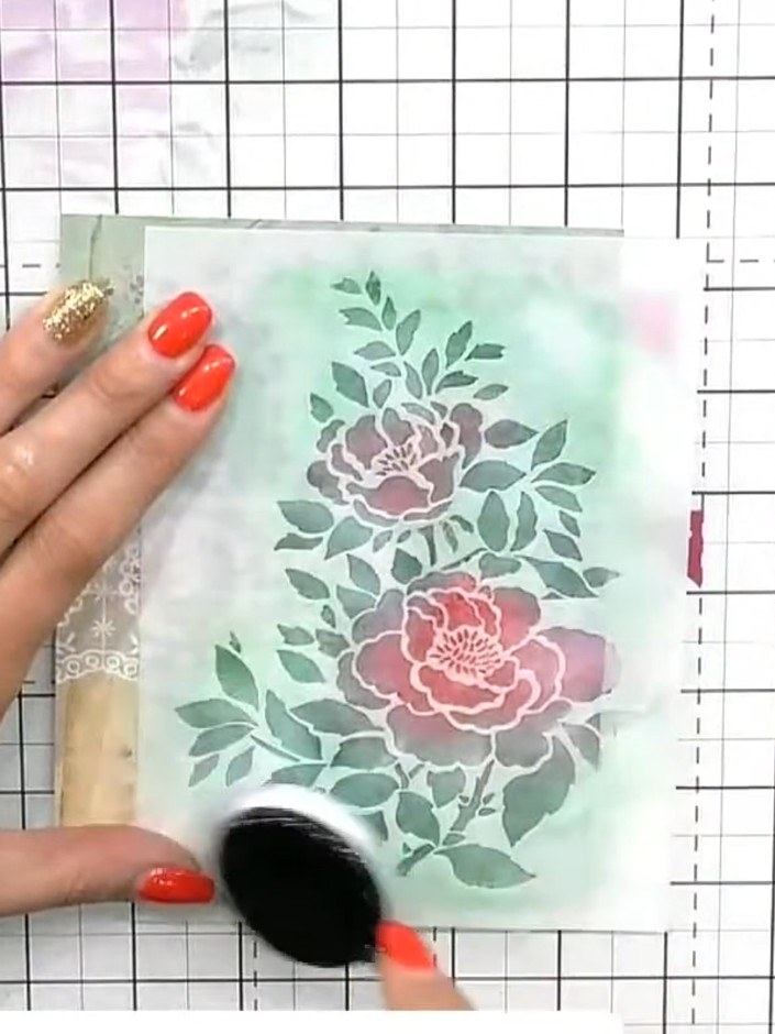 Step 3: Load a clean blending brush with white pigment ink and tap off any excess on a scrap piece of paper.