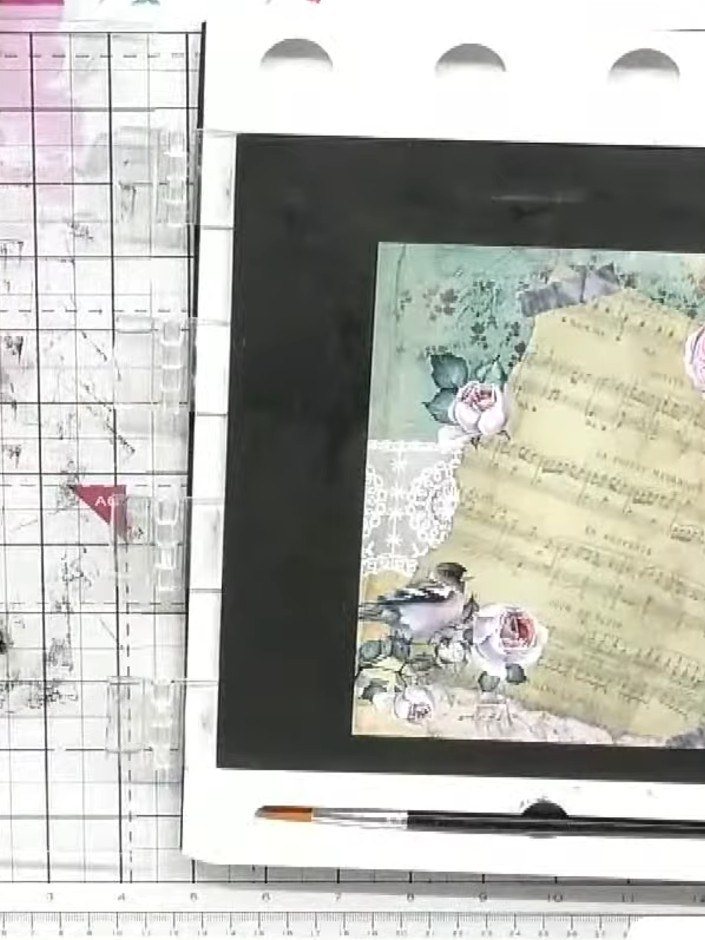 Step 1: Select a piece of patterned paper from the Wistful Charm paper pad. Feed the paper through your cutting machin