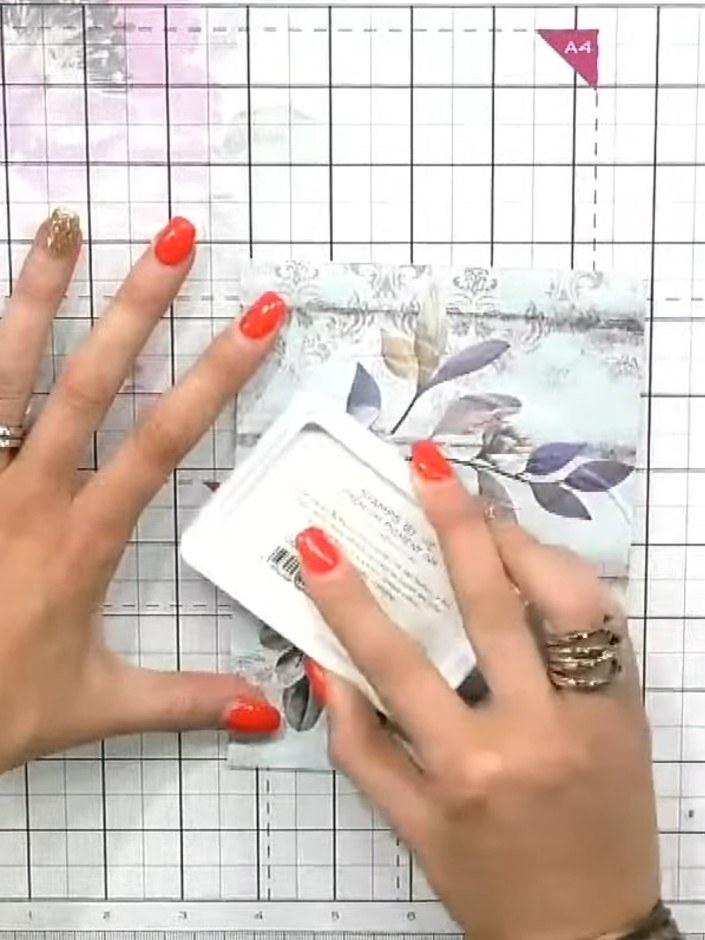 Step 3: Tap a white ink pad over the embossed surface to highlight the raised areas and bring out the detail of the fl