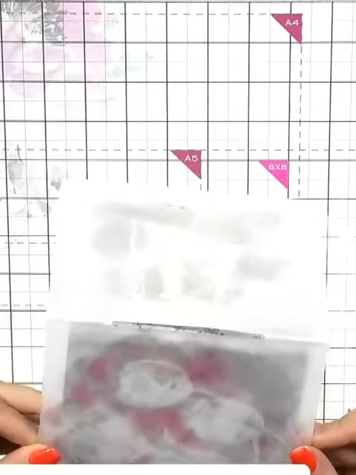 Step 8: Place the painted mount back into the embossing folder and run it through the die-cutting machine again to tra