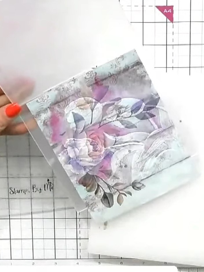 Step 9: Using white ink, carefully highlight the raised embossed details on the painted mount to make them stand out a