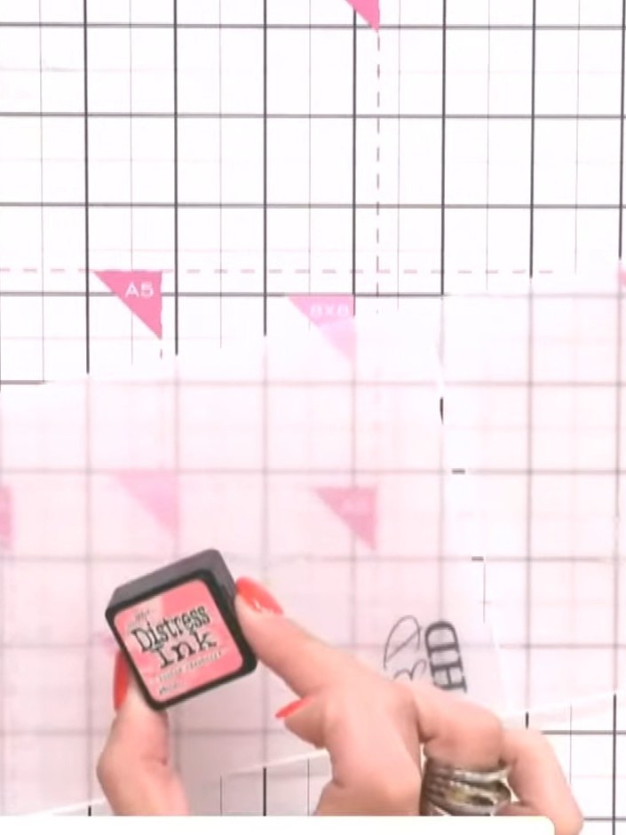 Step 2: Run the inked embossing folder through your die-cutting machine with white cardstock. This will create the emb