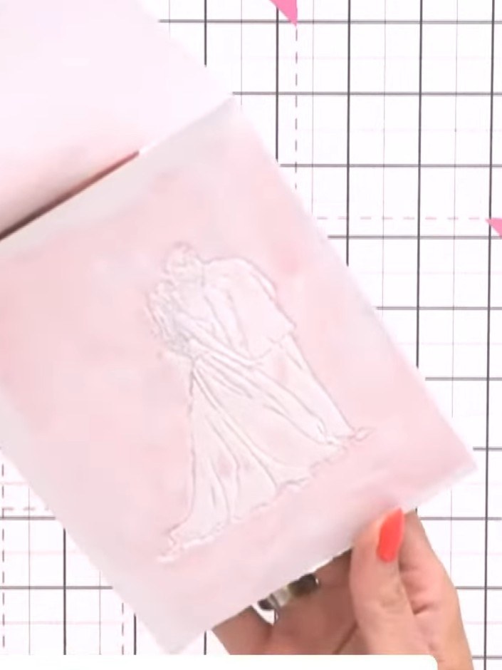 Step 4: Run the embossing folder through the machine again with the design facing the opposite direction to create a d