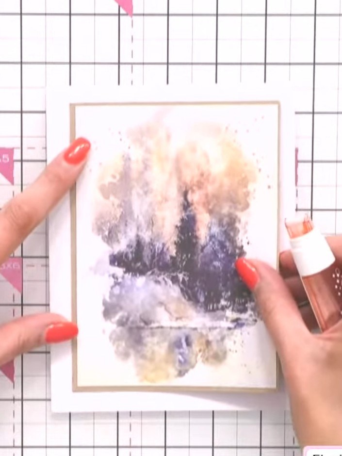 Step 1: Select a pre-painted watercolour mount featuring complementary colours. The mount shown has purple, pink and g