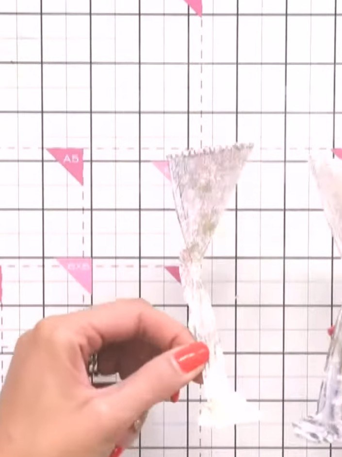 Step 9: Carefully cut out the curtain designs following their outlines with scissors. Take your time to cut precisely 