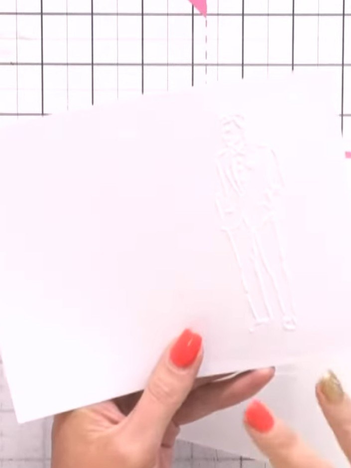 Step 6: Layer a watercolour background paper behind the white panel. Position it so the design shows through attractiv
