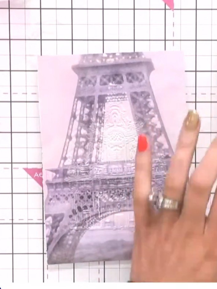 Step 3: Take a pink ink pad and lightly tap it across the background area of the stamped image to add colour. Use a ge