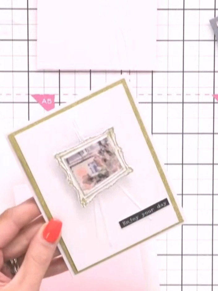 Step 2: Use the 3D embossing folder to emboss the easel frame design onto a separate piece of white card stock. Run it