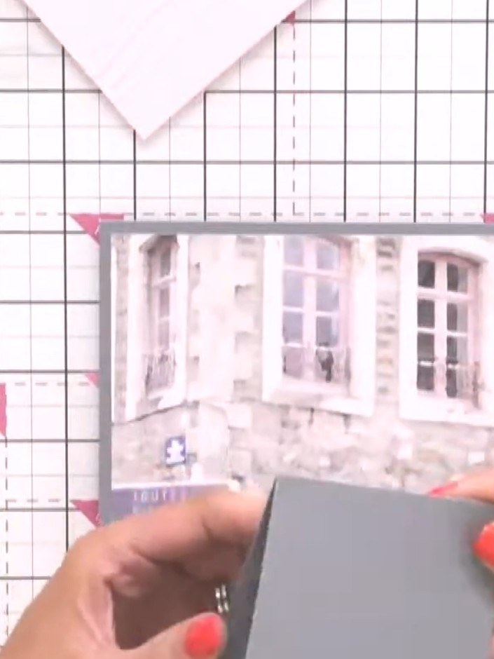Step 4: Create a tab from patterned paper offcuts. Trim the tab with scissors to create a decorative shape for visual 