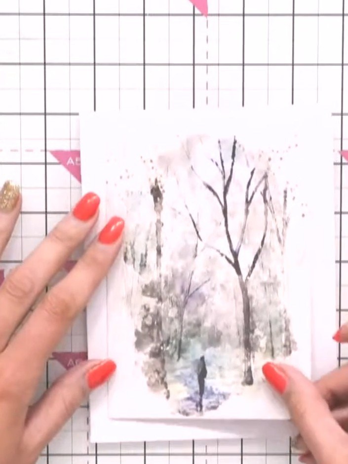 Step 2: Select your chosen winter scene design from the Stamps By Me collection and emboss it onto white card stock us