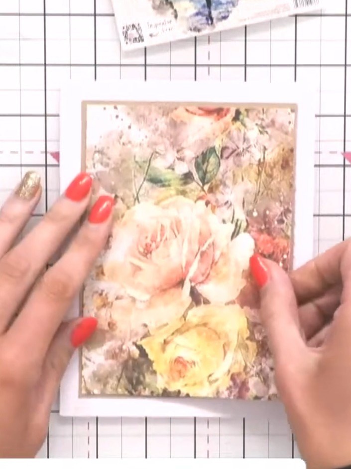 Step 4: Position the mounted image panel onto your card base and smooth it down firmly to secure it in place.