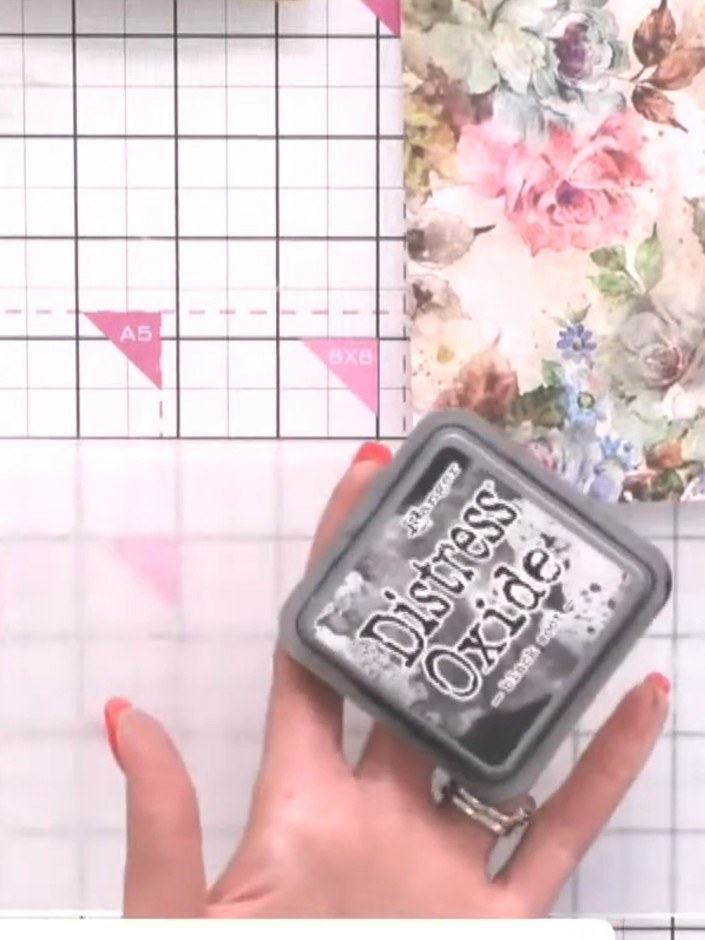 Step 1: Ink up the Abbey embossing folder with black Distress Oxide ink, tapping it across both the front and back of 