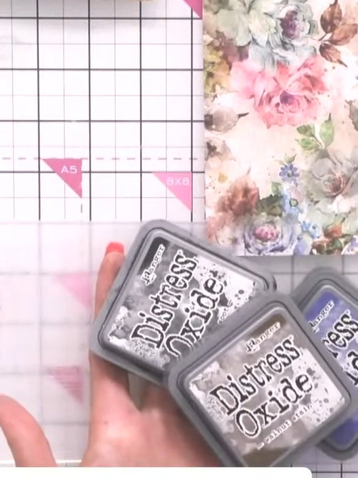 Step 2: Spray the inked embossing folder lightly with water on both sides. Use a fine mist spray to dampen the folder 