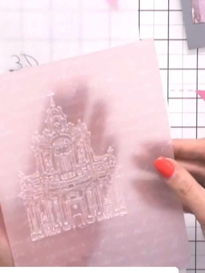 Step 2: Place the stamped vellum piece into the embossing folder and run through a die-cutting machine to emboss the d